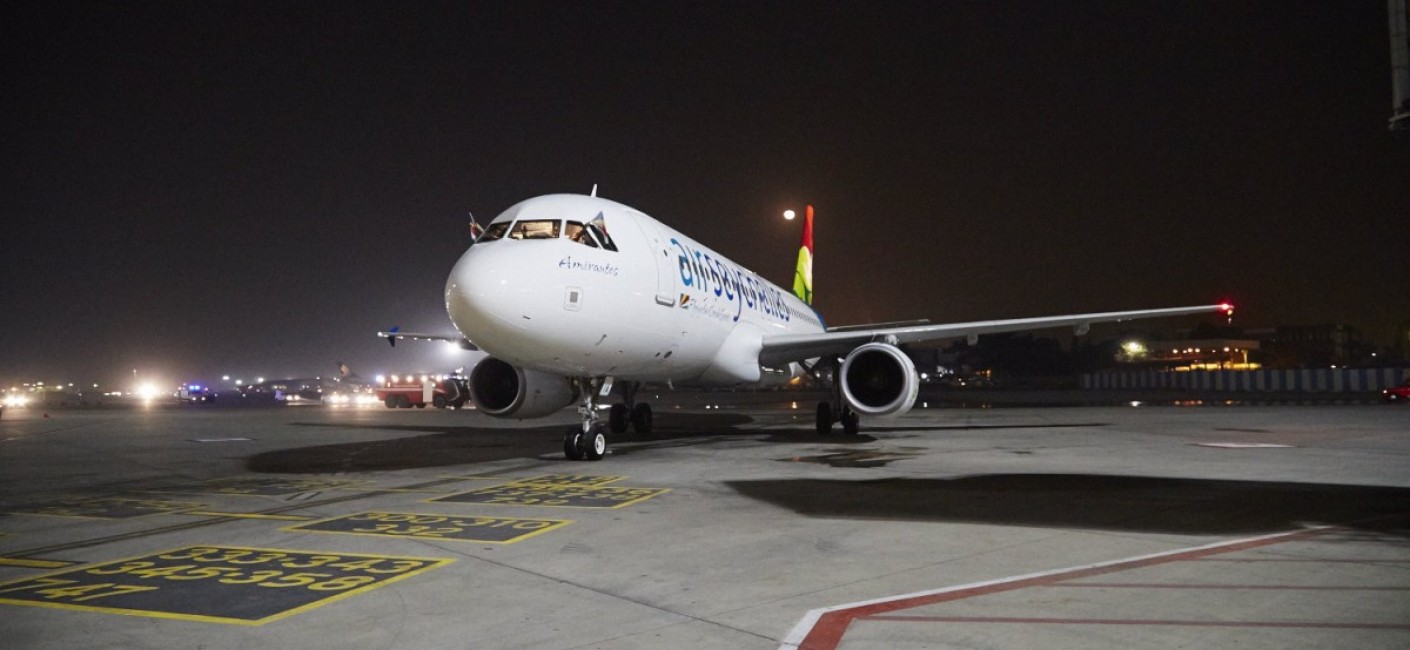 The flag of Seychelles is proudly waved from the cockpit windows