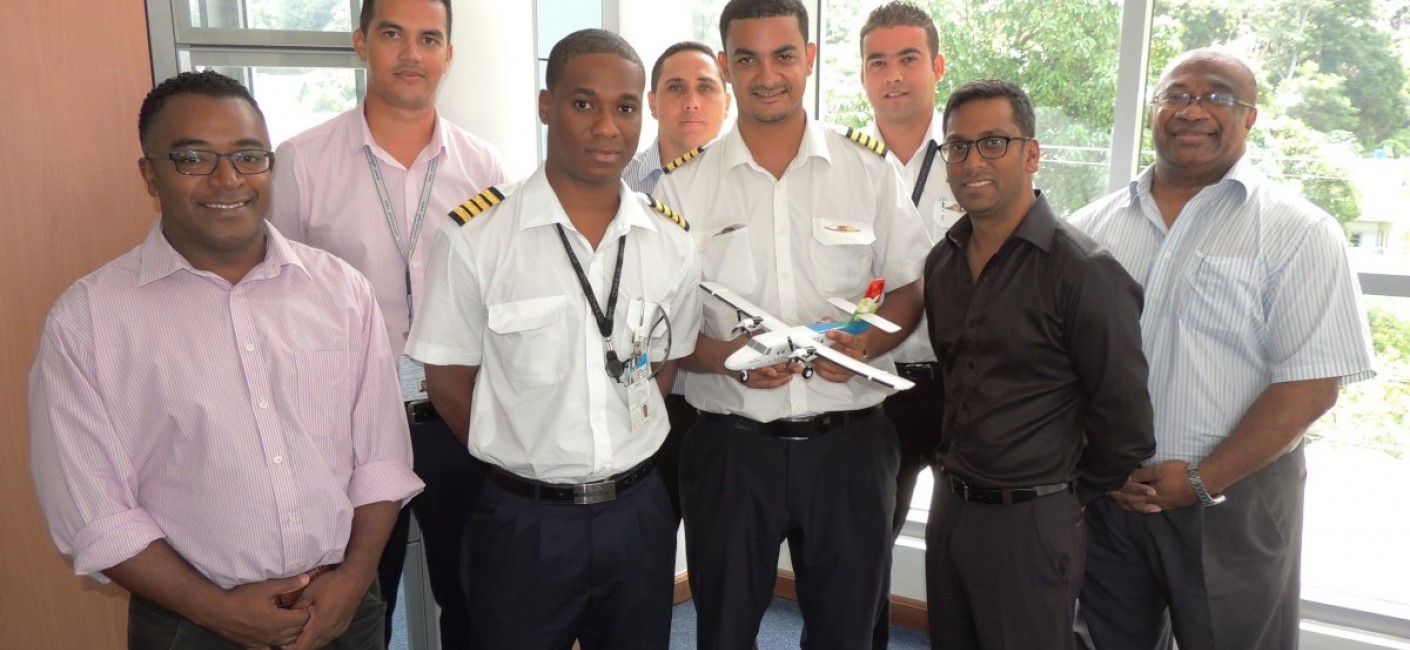 (From left) Alan Renaud, General Manager Corporate Affairs, Allen Dubignon, Chief Pilot Domestic, Captain Russel Morel, Captain Sandy Benoiton, Head of Crew Training, Captain Juan Romain, Captain Bertrand Mein, Manoj Papa, Air Seychelles’ Chief Executive Officer, and Captain Granger Narara, Head of Flight Operations, pose for a souvenir photograph